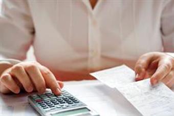Businesswoman calculating data