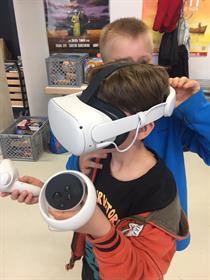 A child uses VR glasses