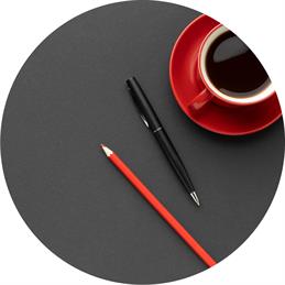 Working time: Desk pad with coffee cup and pens