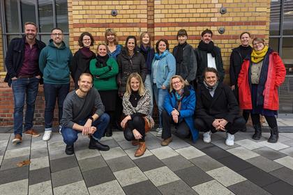 Group photo of the participants in the exchange meeting